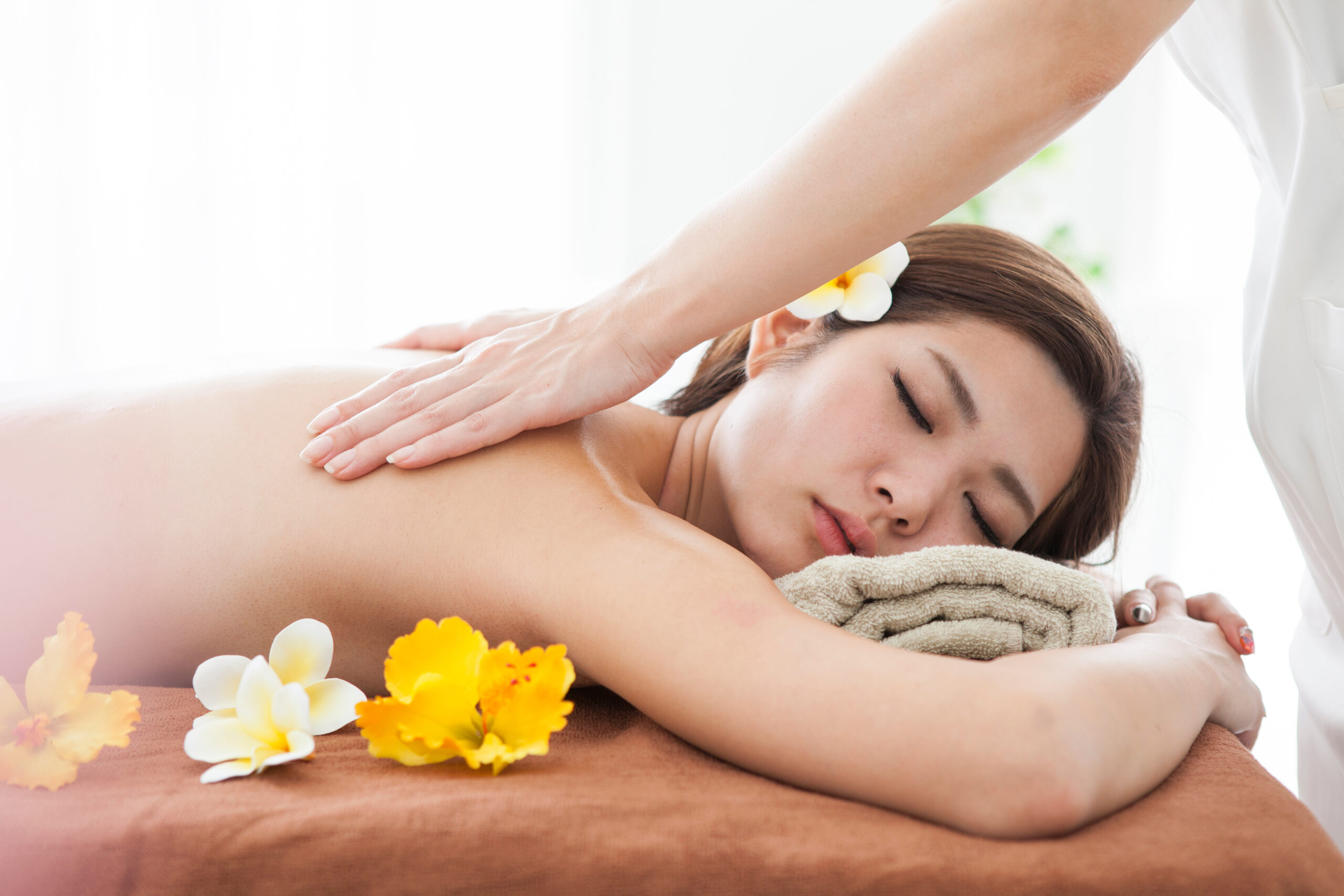 The woman is feeling pleasantly massaged